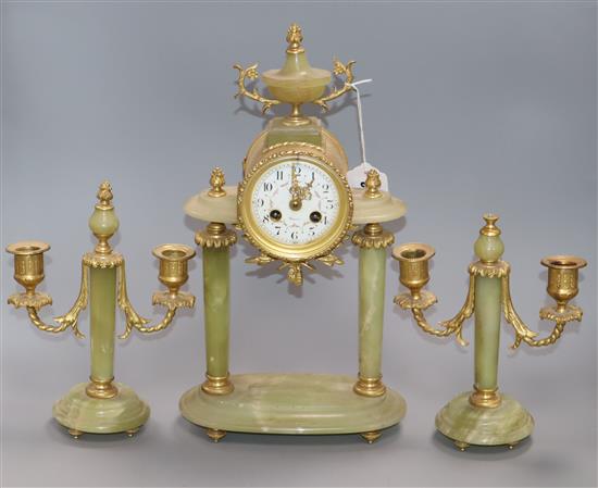 An early 20th century ormolu mounted green onyx clock garniture, the clock signed Galier Rouen clock 37cm candelabra 23cm